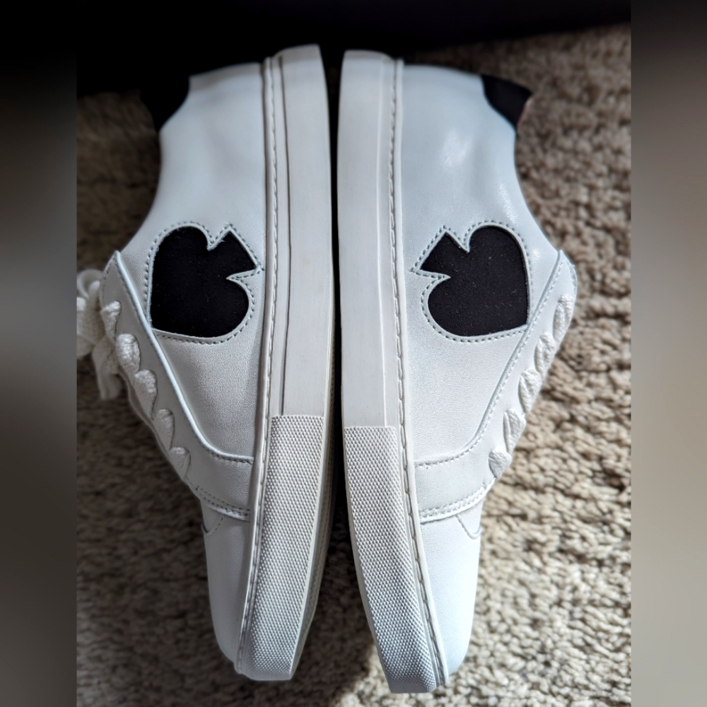 Kate Spade Fez leather and suede sneaker with Spade emblem on outside.  Size 7